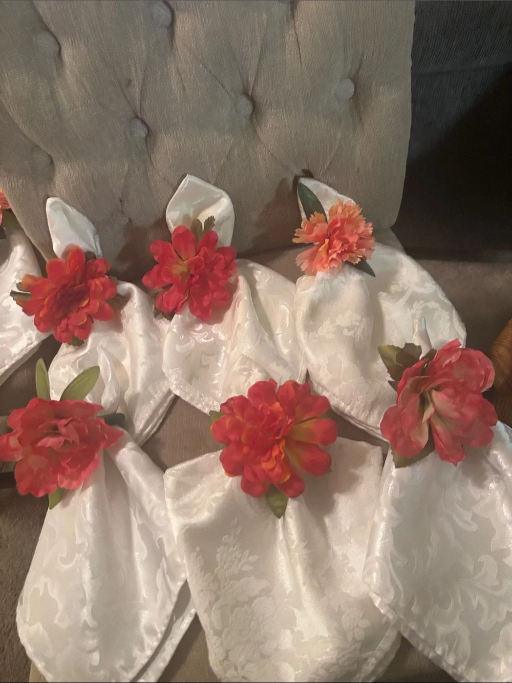 Six large easy care white napkins and 6  floral napkin rings.